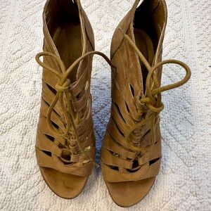 Peep toe lace up sandal from Stuart Weitzman, size 7.